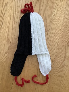 image of black and white knitted hat
