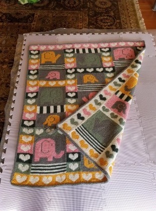 image of knitted quilt