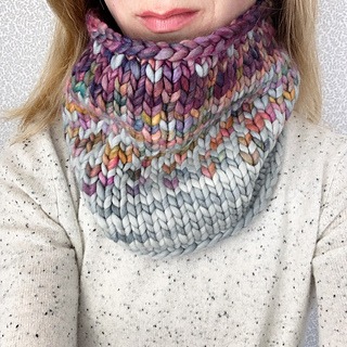 Bottom of woman's face wearing hand knit cowl