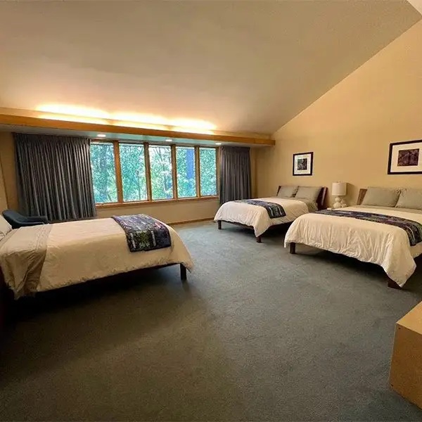 Photo of a three bed room at Woodlake Retreat Center